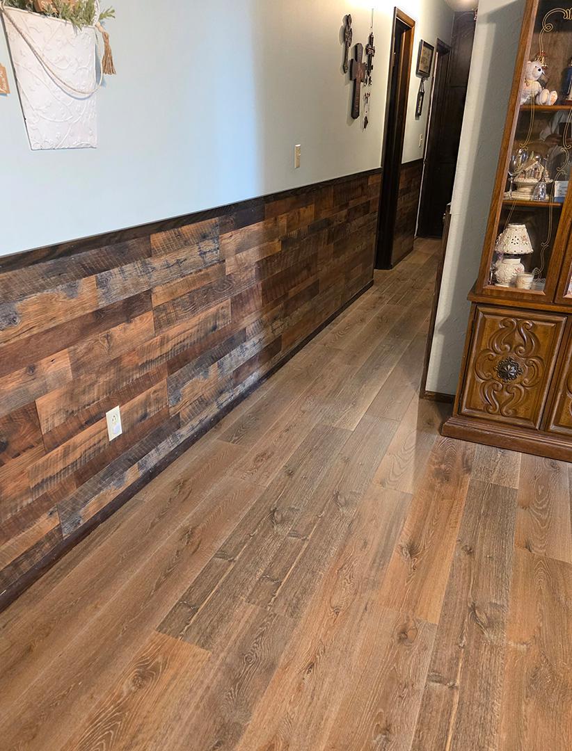 wood flooring and wood accent wall