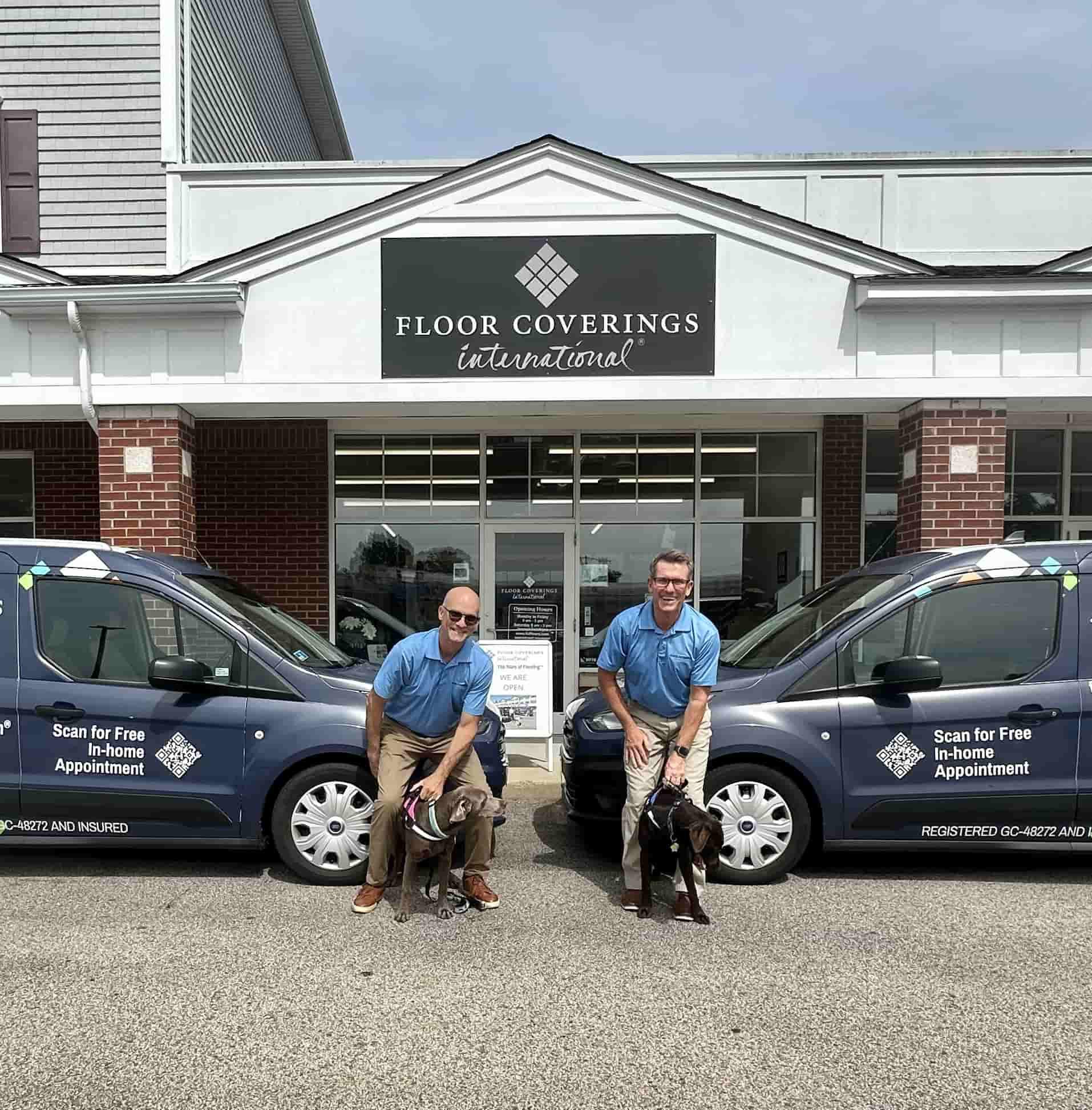 Two men stand beside a van with a dog, representing South Rhode Island Flooring Experts in Westerly.