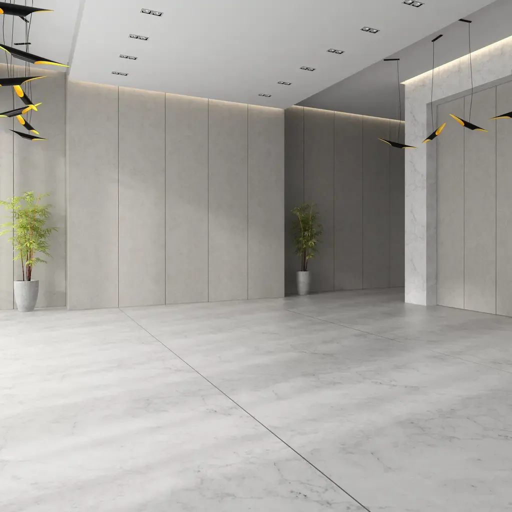 Spacious empty room with a polished marble floor and pristine white walls, created by Custom Tile, Jupiter, FL.